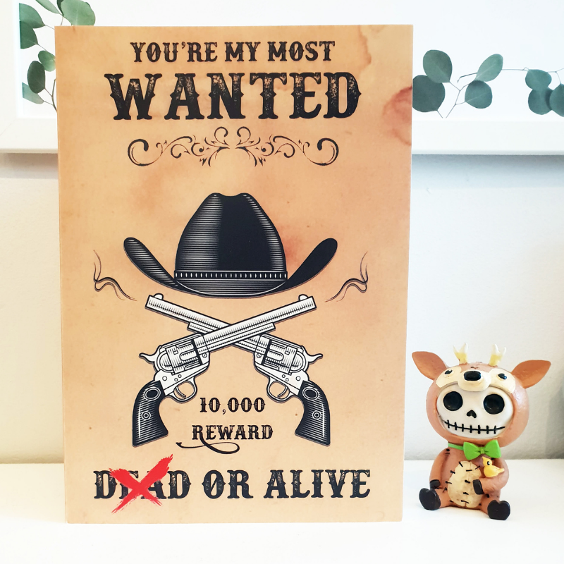 "most wanted" cowboy card